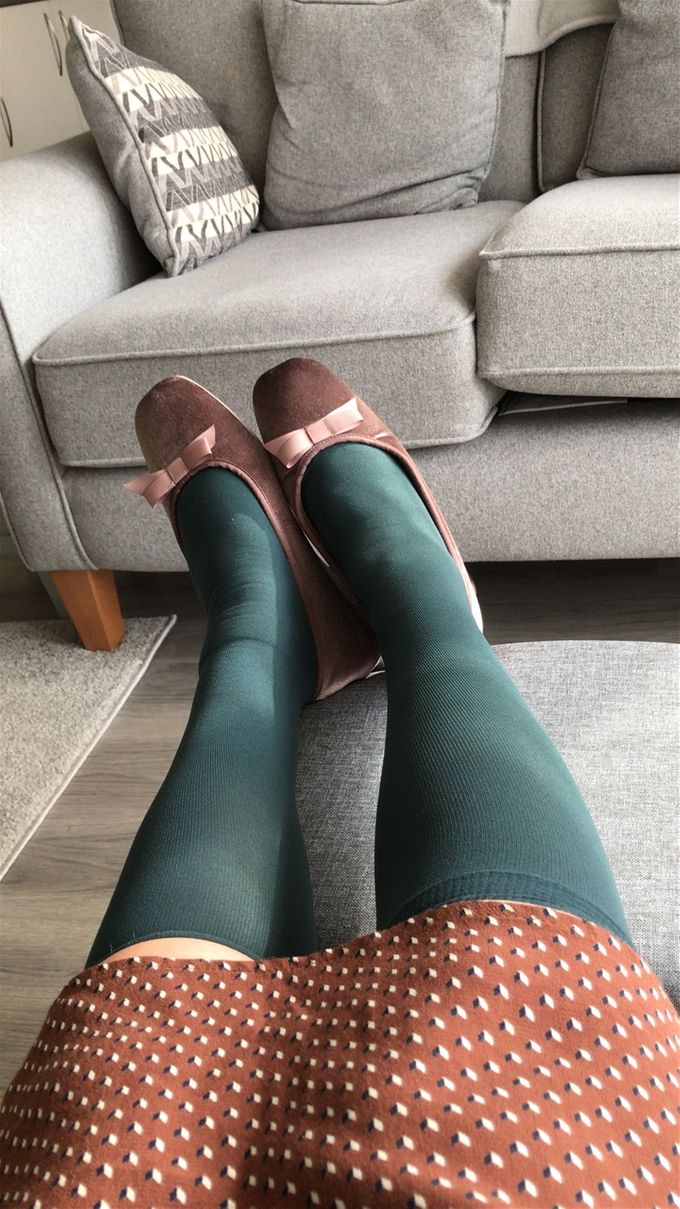 Striving away for elegance and sophistication whilst wearing green knee socks.